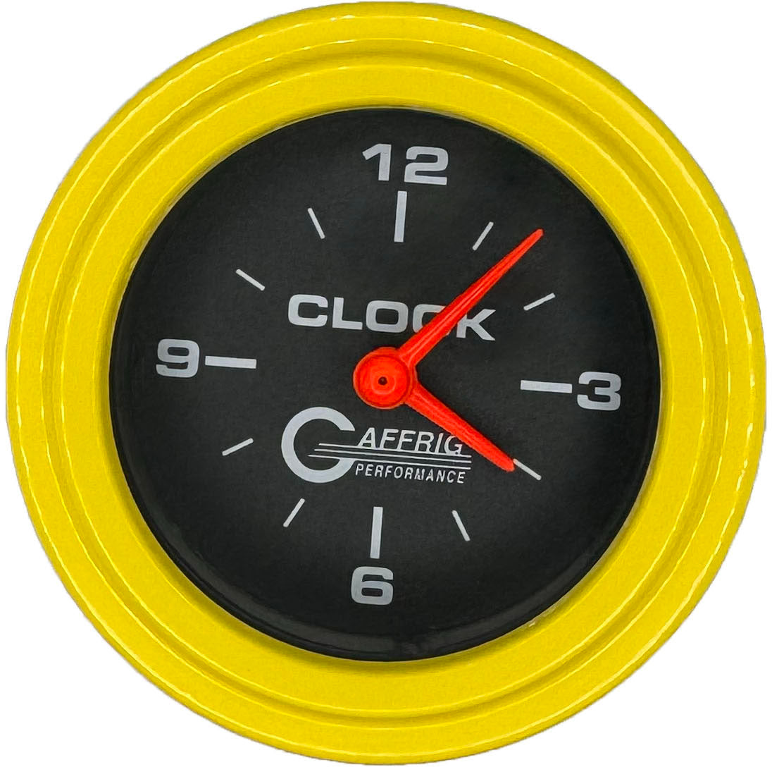 GAFFRIG PART #5054 2 INCH ELECTRIC CLOCK GAUGE BLACK YELLOW / STEP RIM