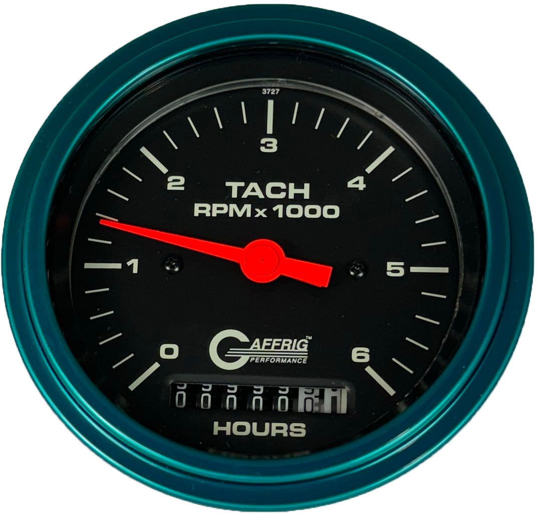 GAFFRIG PART #4258 3 3/8 INCH ELECTRIC TACH/HOUR METER GAUGE 0-6000 RPM BLACK TEAL / STEP RIM