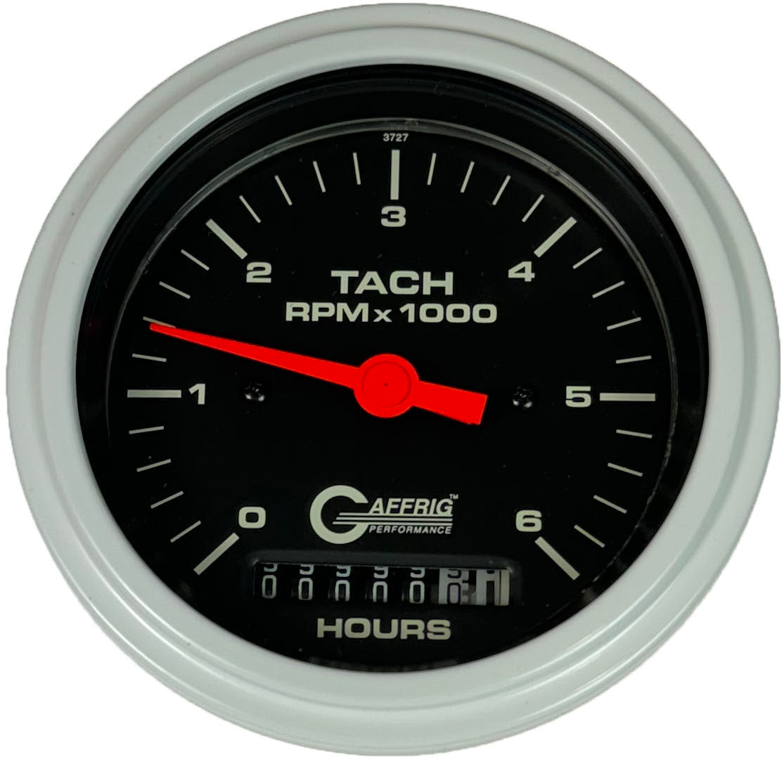 GAFFRIG PART #4258 3 3/8 INCH ELECTRIC TACH/HOUR METER GAUGE 0-6000 RPM BLACK WHITE / STEP RIM