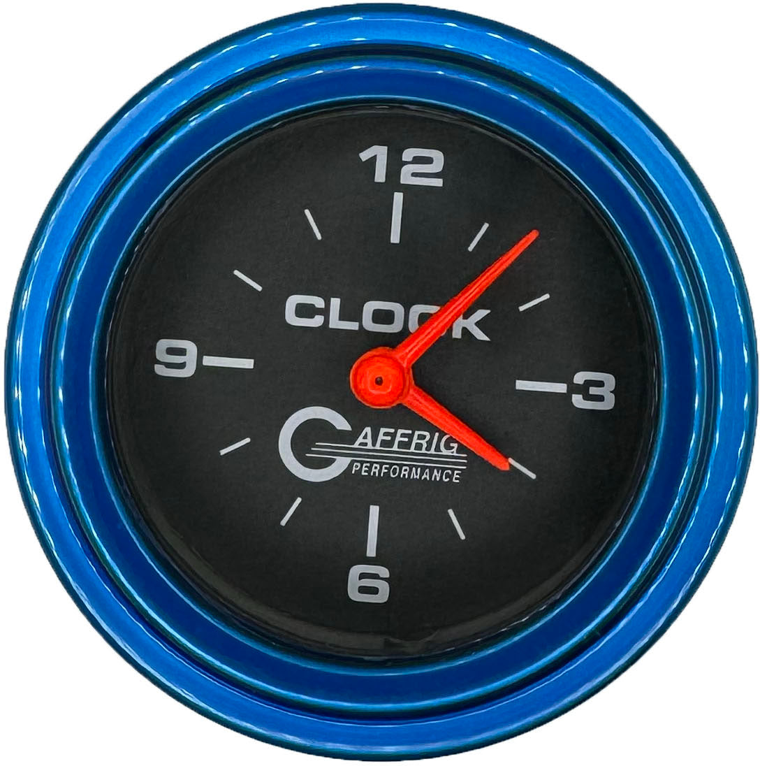 GAFFRIG PART #5054 2 INCH ELECTRIC CLOCK GAUGE BLACK BLUE / STEP RIM
