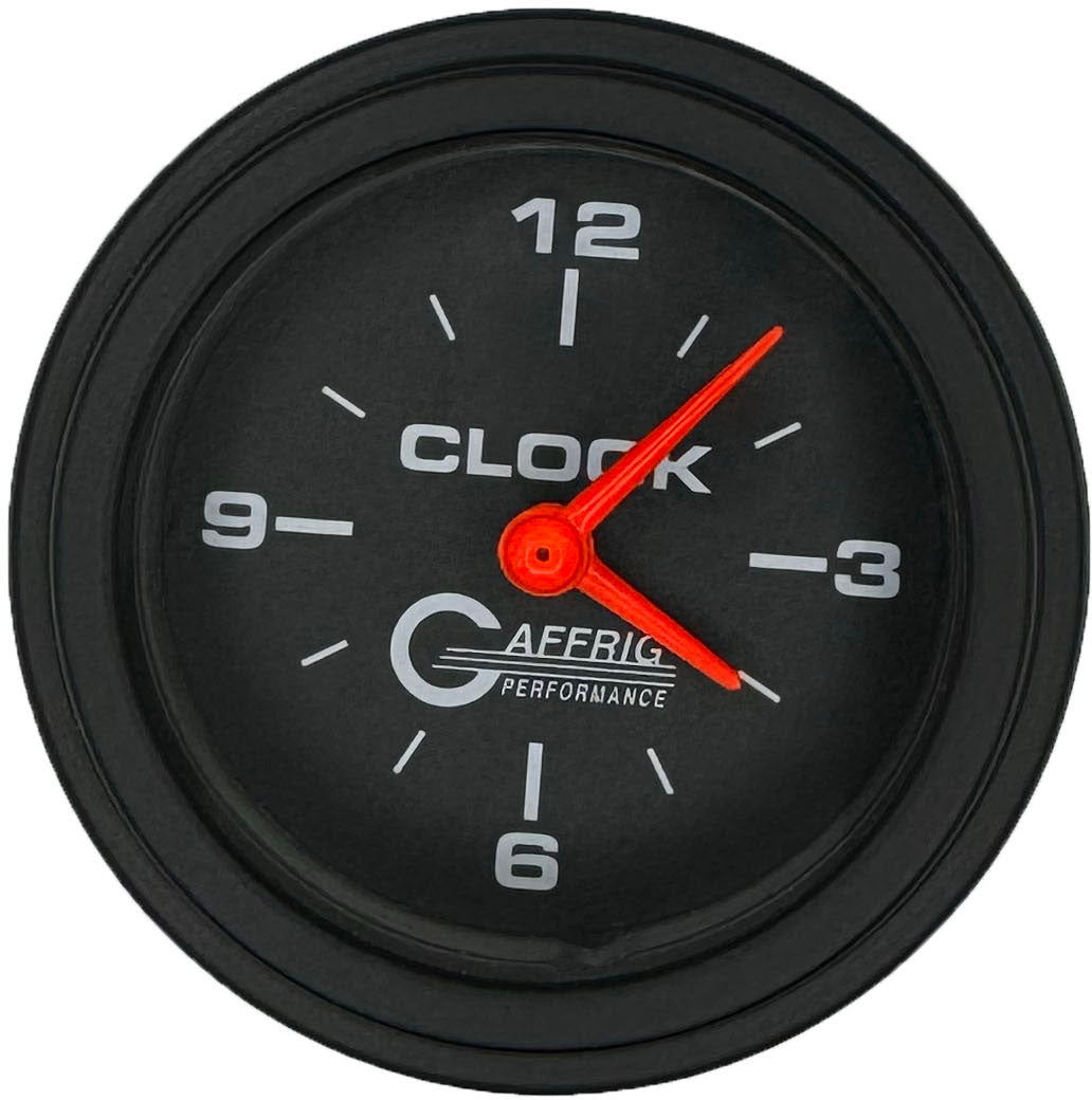 GAFFRIG PART #5054 2 INCH ELECTRIC CLOCK GAUGE BLACK BLACK / STEP RIM